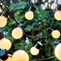 Butlers 10 Lichterkette 24 Lichter Outdoor Länge 11m SUNSET In Schwarz-Weiß